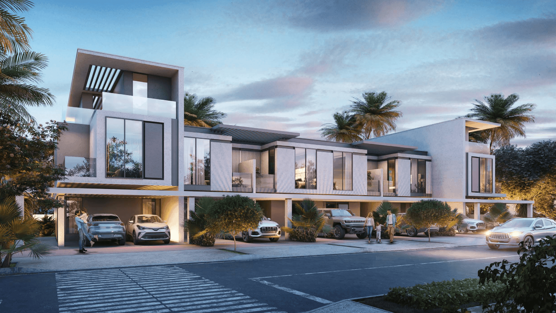 Modern apartment building with large windows, parked cars, and palm trees at sunset.